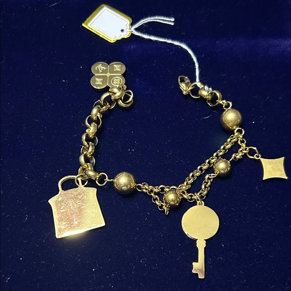 Gold Charm Bracelet with Key and Lock